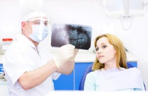 4 Differences Between Dental Implants and Bridges